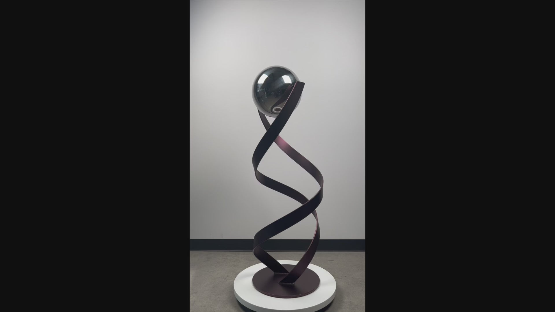 Contemporary metal sculpture Syncrospective by Ottawa artist Timothy Gordon Johnson