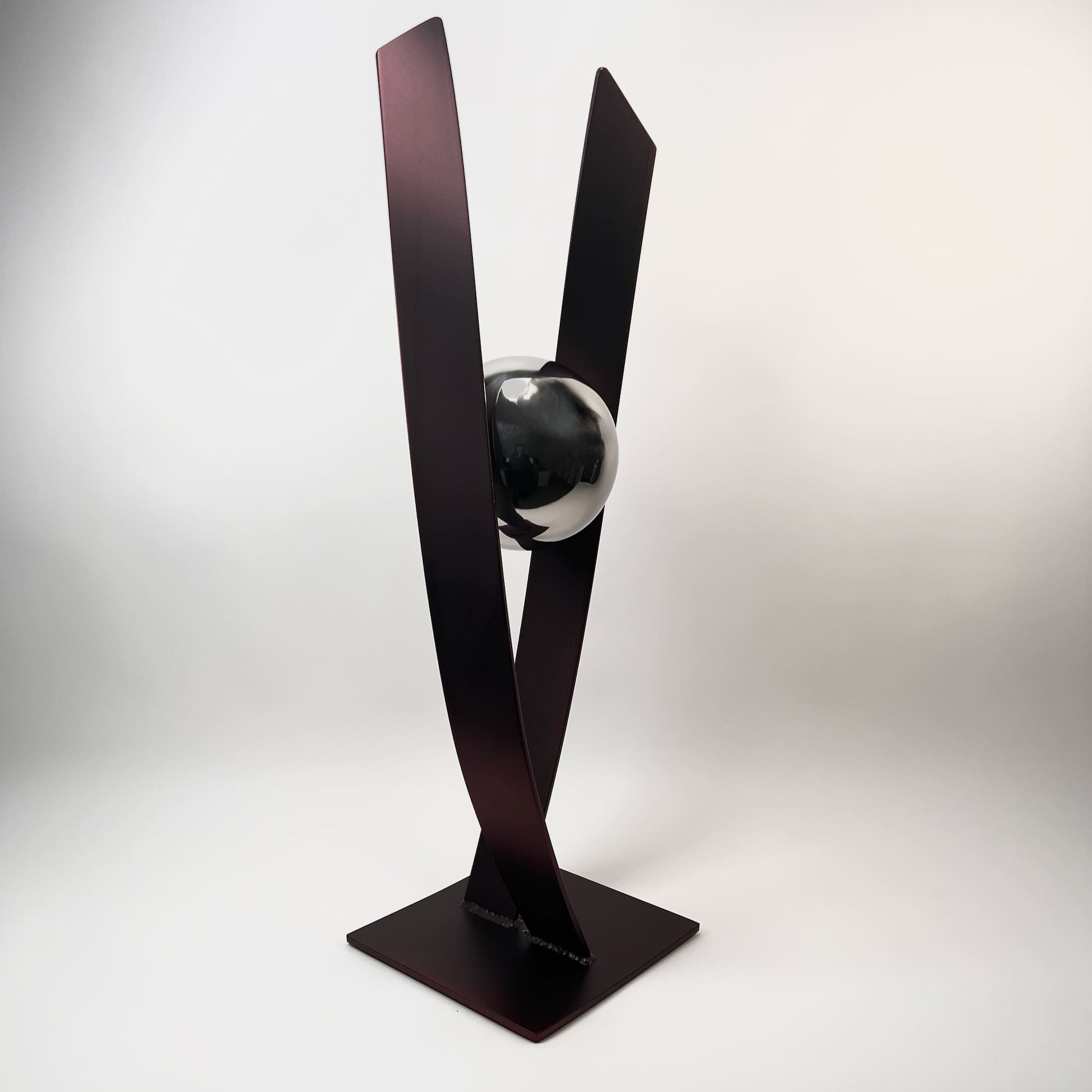 Contemporary metal sculpture series Love Is Presence by Ottawa artist Timothy Gordon Johnson.