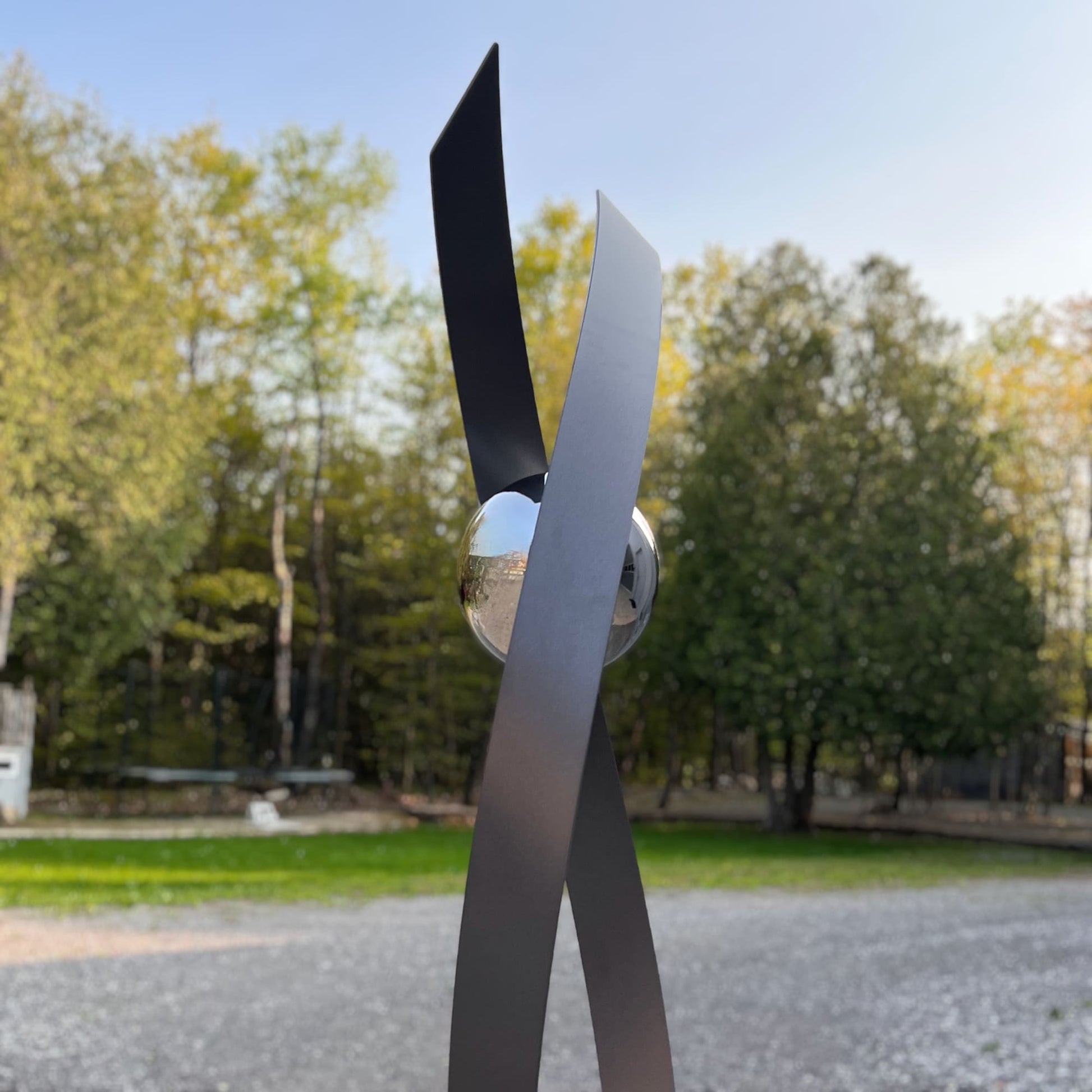 Contemporary metal sculpture Love Is Presence by Ottawa artist Timothy Gordon Johnson