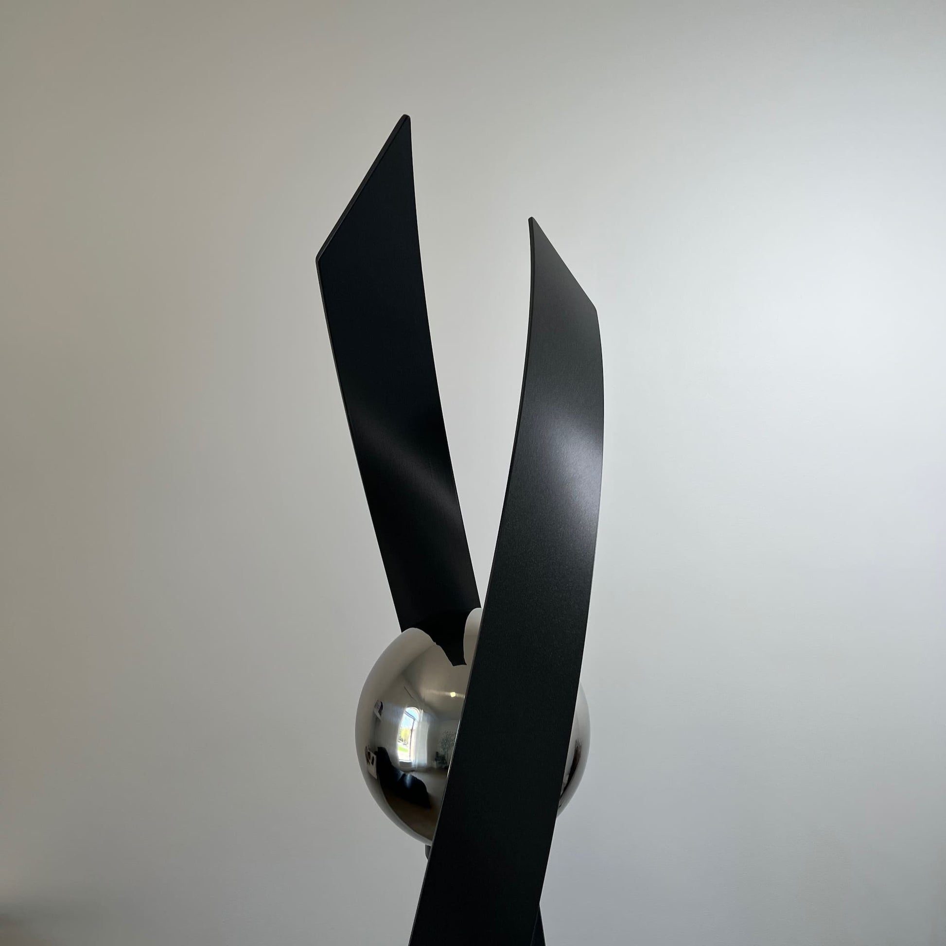 Contemporary metal sculpture Love Is Presence by Ottawa artist Timothy Gordon Johnson