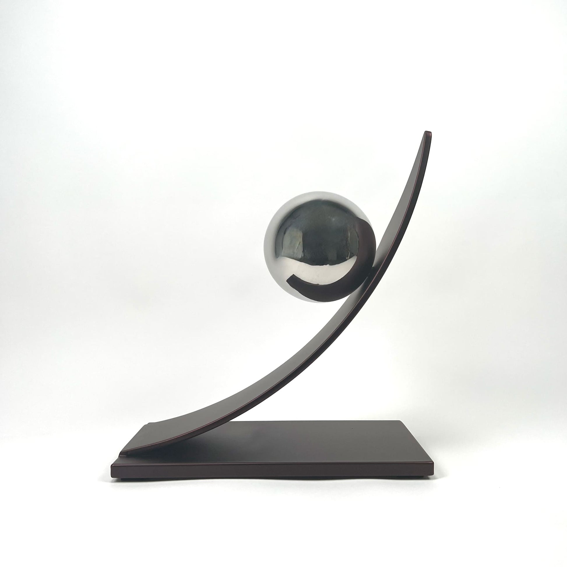 Contemporary metal sculpture series Orbit by Ottawa artist Timothy Gordon Johnson